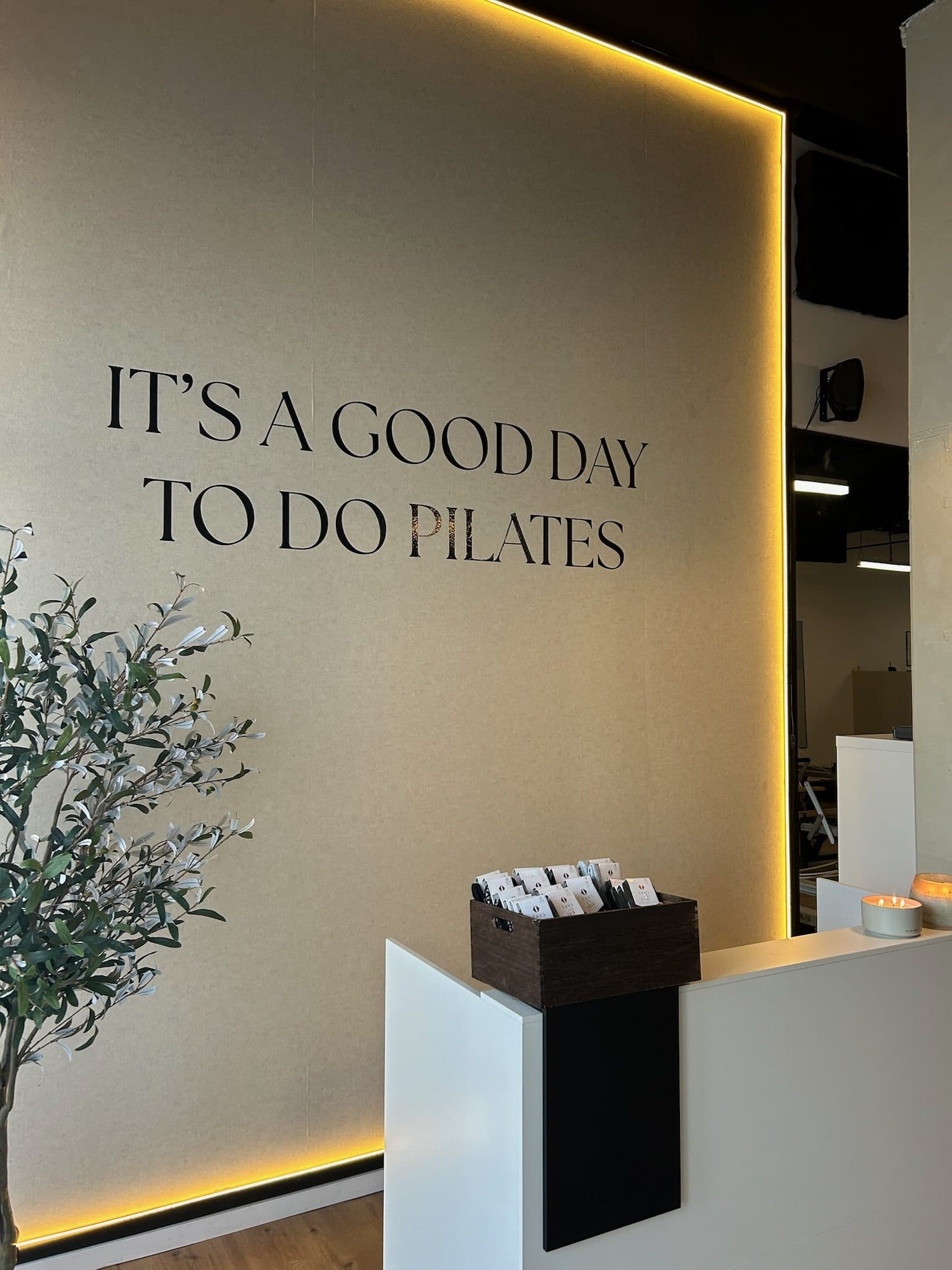Reception wall reading "It's a good day to do Pilates" at Bodies and Pilates in North Hollywood